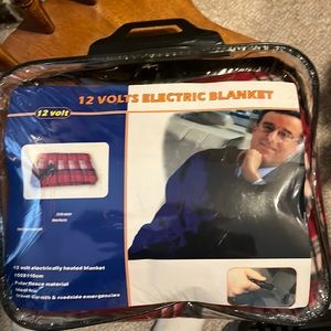 12 volt Electric blanket, which plugs into your cigarette lighter in your car